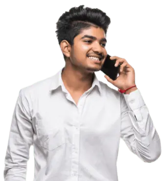 An Indian dressed in white is using Slickcall application to call abroad without any hurdle
