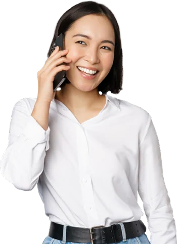 A girl dressed in white is using the budget friendly international calling service of Slickcall